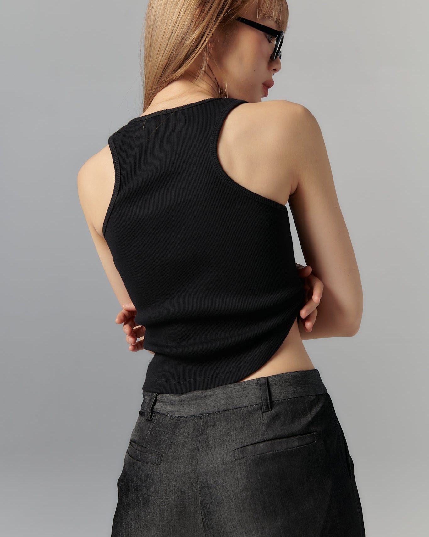 ASYMMETRICAL U-NECK TANK IN BLACK
