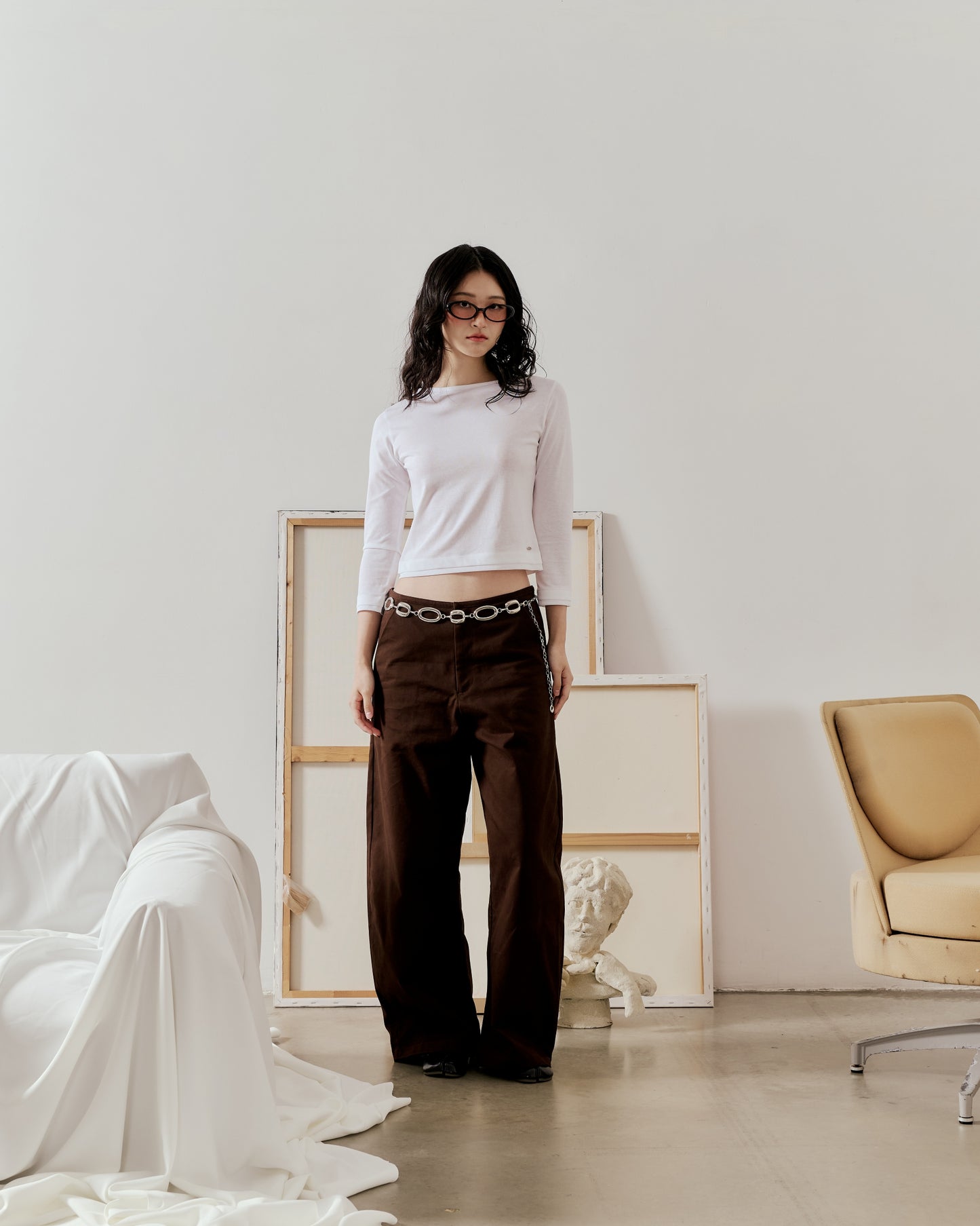BAGGY CURVED PANTS IN BROWN