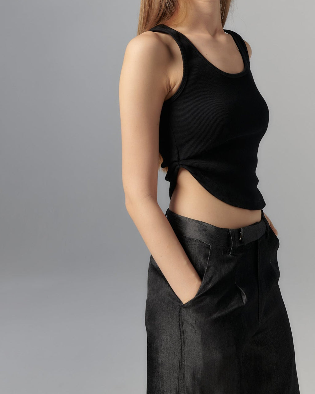 ASYMMETRICAL U-NECK TANK IN BLACK