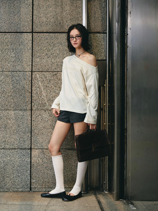 LONGSLEEVE OFF-SHOULDER IN CREAM