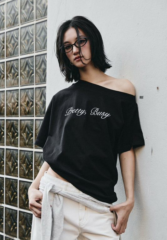 PRETTY, BUSY TEE IN BLACK