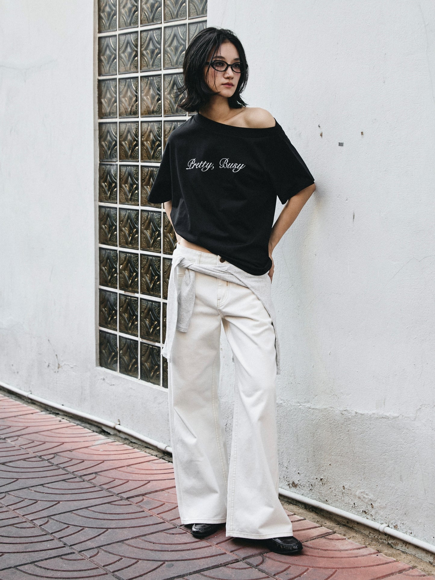 PRETTY, BUSY TEE IN BLACK