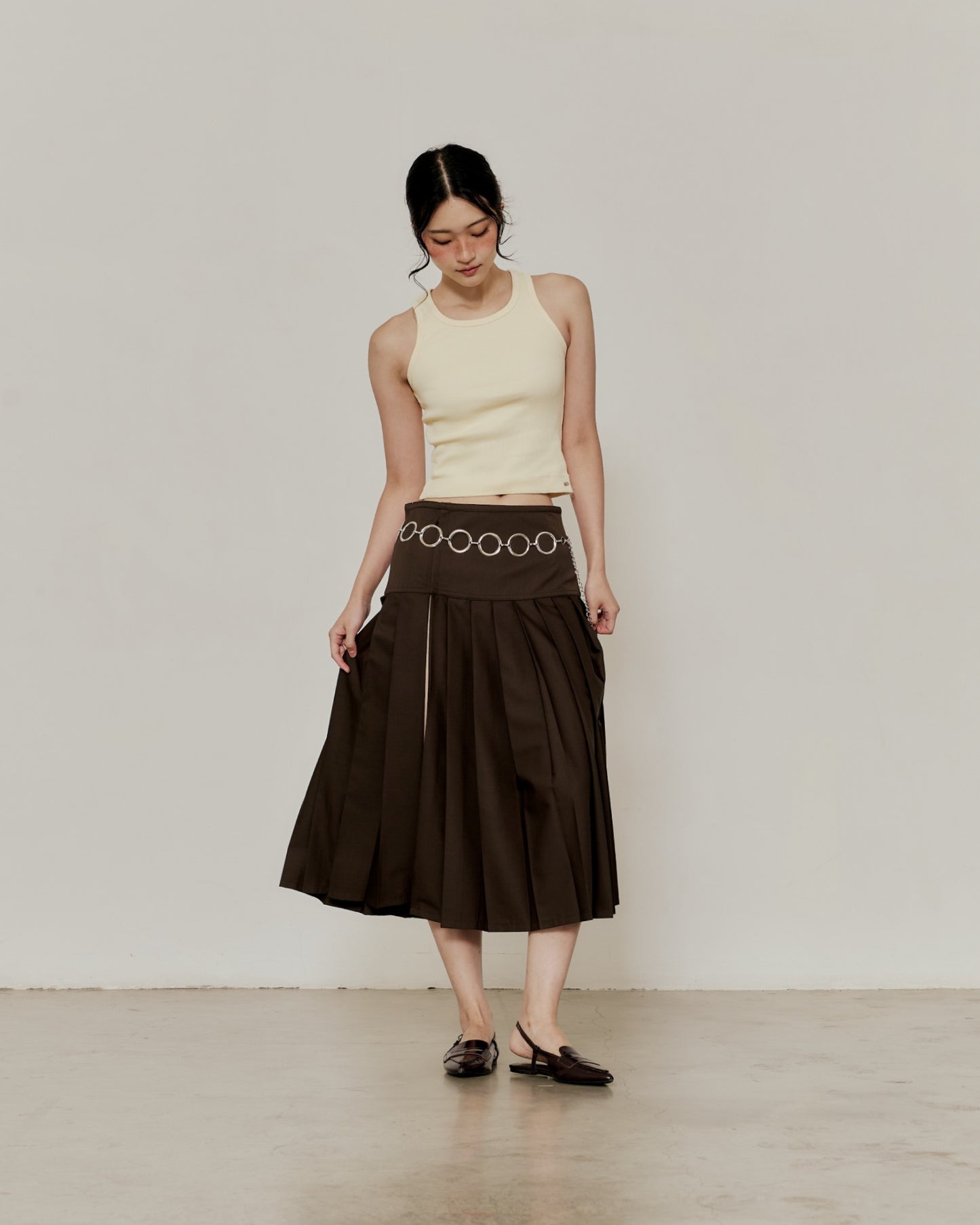 PLEATED MIDI SKIRT IN BROWN