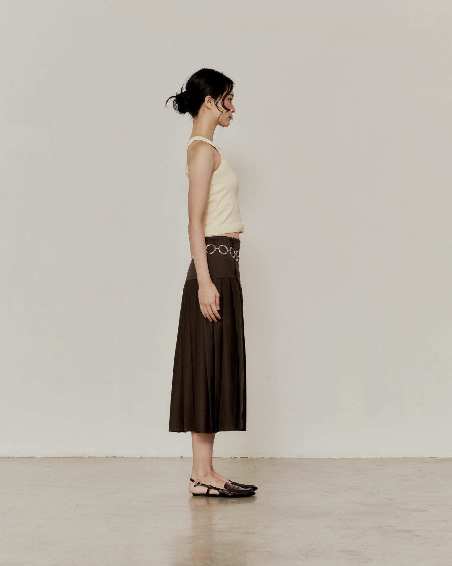PLEATED MIDI SKIRT IN BROWN